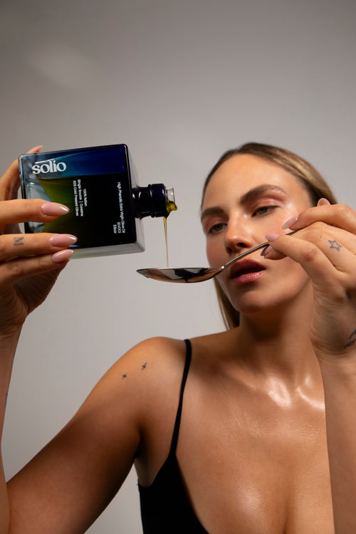 Pouring Solio olive oil